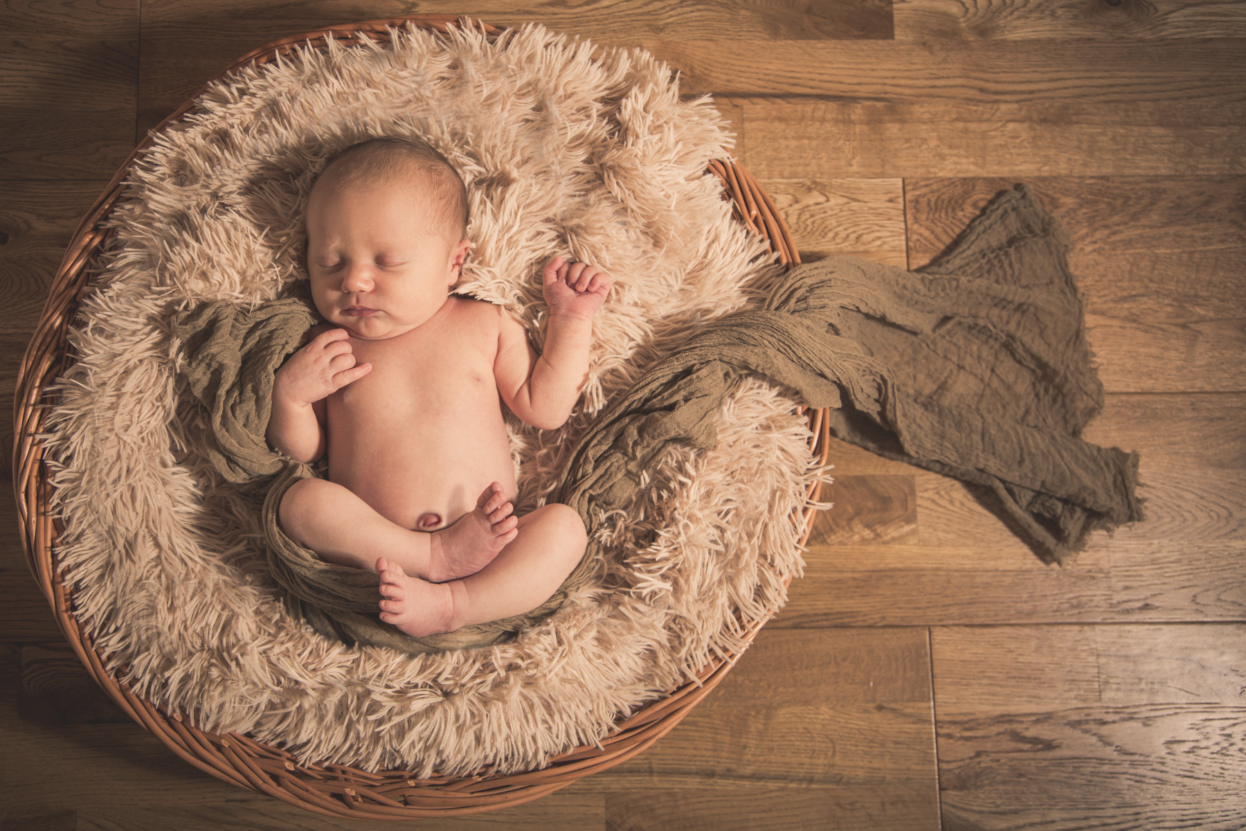 baby in basket photography